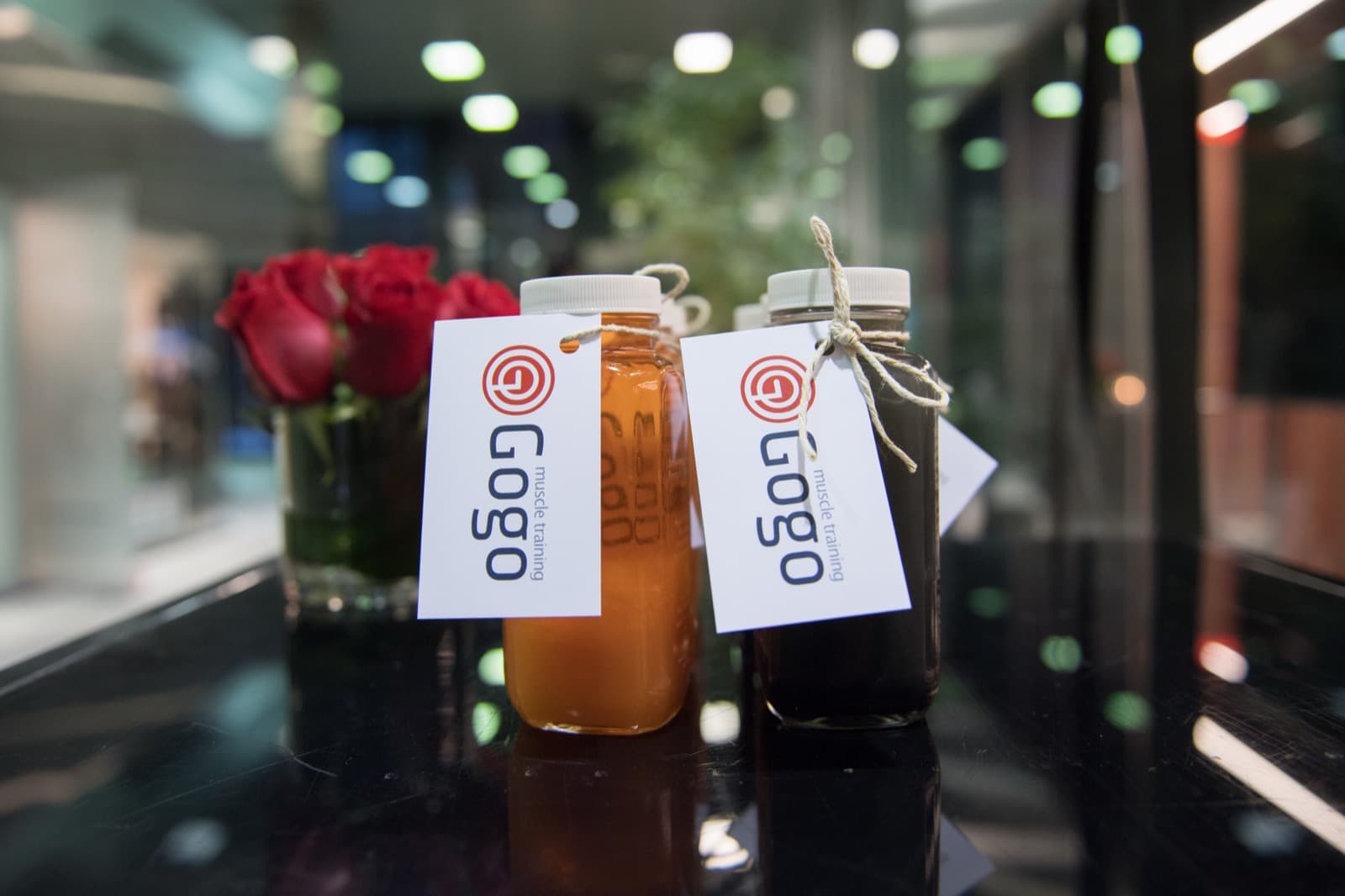 Branded GoGo refreshments and roses laid out for the studio's launch event